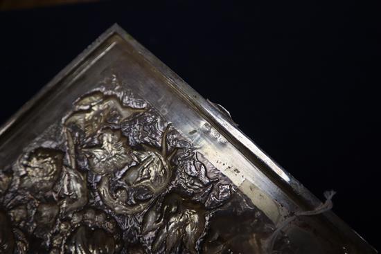 A Far Eastern white metal square box with embossed decoration of cranes and flowers